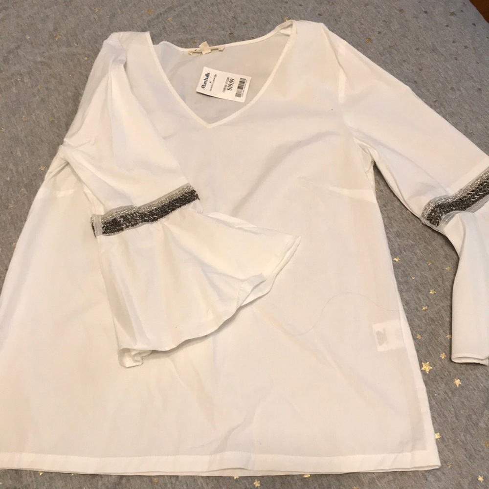 White detailed Bell sleeve blouse.